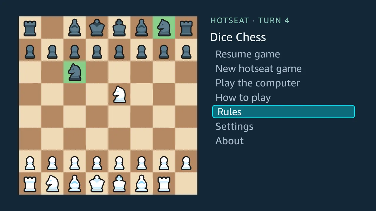The home menu with OK held down on Rules: the focused item is framed, filled more strongly while the button is held, and slightly smaller